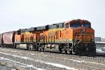 Tied down grain train waits in the yard